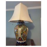 Large Spanish Talavera lamp on wooden base, blue, gold, and burnt orange. 30 inches.