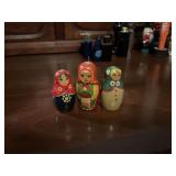 Three hand-painted miniature Russian doll ornaments