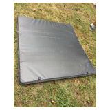 Gator SFX soft trifold truck bed cover measuring 60 by 60. Some insulation may need replacing. Came off a  2017 GMC