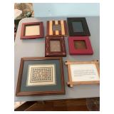 11 1/2 inch x 9 inch cross stitched picture along with other miscellaneous frames