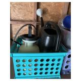 Ortho weed sprayer and a watering can