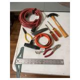 Assortment of miscellaneous tools and extension cords