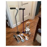 Two walking canes +4 bathtub accessories