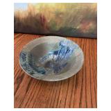 Multicolored pottery bowl in greens and blues 6 1/2“ x 2 1/2“. Can’t make out the name on bottom.