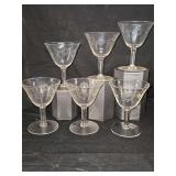 Set of six hand engraved wine glasses. 4.5 in tall.