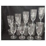 Set of 11 iced tea glasses with etched morning glory bloom.