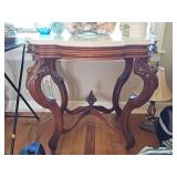 Antique marble top table. 32x24x30 in tall. Contents NOT included.