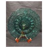 Research indicates this is a Fenton Paneled Grape Laurel Green Teal Cake Plate with small foot. 11.5" includes easel.