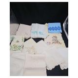Embroidered napkins, flour sack dish towel, antique crocheted napkins or handkerchiefs, and more.