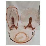 Three pieces of yellow depression glass. 8.75 in plate, 9.5 x 2.75 inch tall bowl with reticulated handles, 8.75 x 5.5 X 1 in tall tray. Foot of bowl has chips and sticker residue
