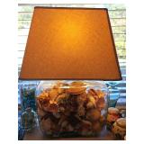Lamp with sea shells. Interior of base can be filled with decor of your choice. 13x6x22 in tall.