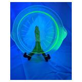 Uranium glass plate. 9.5 in diameter. Easel not included.