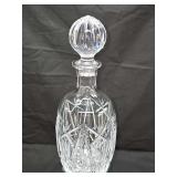 Crystal decanter with classic starburst pattern. 12 in tall including stopper.