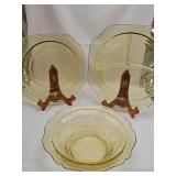 Yellow depression glass pieces. 9 inch square plate, 10.25-in / plate, 9.75 x 2.75 in tall bowl. Divided plate has chips.