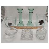 Grouping of vases and candle holders.