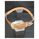 Texas Leather hand made with ornate silver-tone buckle and keeper and brass-toned stud or bead detailing. 30 in size