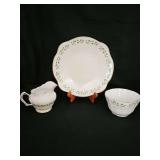 Creamer, open sugar bowl, and cookie plate "Shamrock" made by Royal Tara in Ireland.