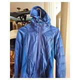 Lululemon blue jacket with Zip out center front w/hood. Size 10