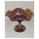 Northwood Amethyst Carnival Glass Compote with Basketweave exterior pattern and a ruffled edge. 5 in tall