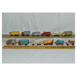 12 Lesney Matchbox commercial trucks, etc.; as is