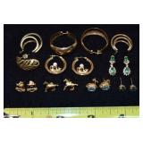 8 pr of 14k gold earrings: one set with diamonds a