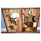 Canada geese depicted on lath boards by a local ar