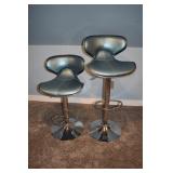 2 chrome and vinyl upholstered adjustable stools,