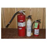 Three fire extinguishers; as is