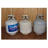 Three 20lb LP gas tanks; as is