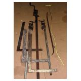 Lot: 3 bar clamps, 3 framing squares, pry bar and