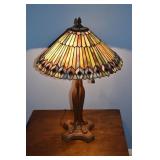 Leaded slag glass table with heavy cast metal base