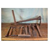 Collection of primitive tools, hammers, chisels, h