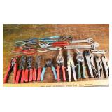 22 assorted pliers, cutters and wrenches; as is