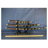 3 Japanese-style Samurai swords with stand; as is
