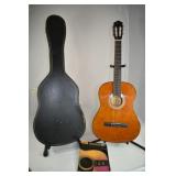 Eleca model DAGIS39YW acoustic guitar with case; a