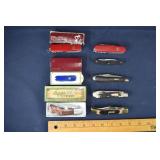 8 knives: 3 Victorinox, 2 Schrade, Imperial, Sabre