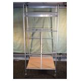 Custom made aluminum bar clamp storage rack on whe