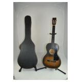 Stella acoustic guitar with period case; as is