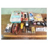Lot: meters, head lights, first aid, gloves, etc.;