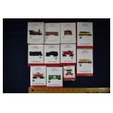 11 Hallmark Keepsake train ornaments, 2013 2015; a