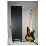 Electric bass guitar with hard case; as is