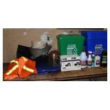 Collection of bins, products, tarp, reflective gea