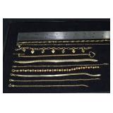 Marked 14 kt gold jewelry: 8 bracelets and 2 ankle