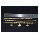 Marked 14 kt gold jewelry: 3 bracelets, 1 with 3 c