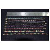 Marked 14 kt gold jewelry: 8 tennis bracelets set