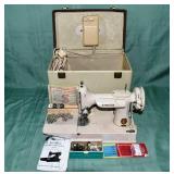 Singer Featherweight model 221K portable sewing ma