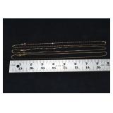 Marked 14 kt gold jewelry: three 18' necklaces 8gt