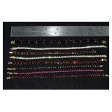 Marked 14 kt gold jewelry: 8 tennis bracelets set