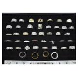 43 rings marked 925, 9ozt.; as is