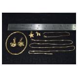 Marked 18 kt gold jewelry: bangle, 24' necklace, b